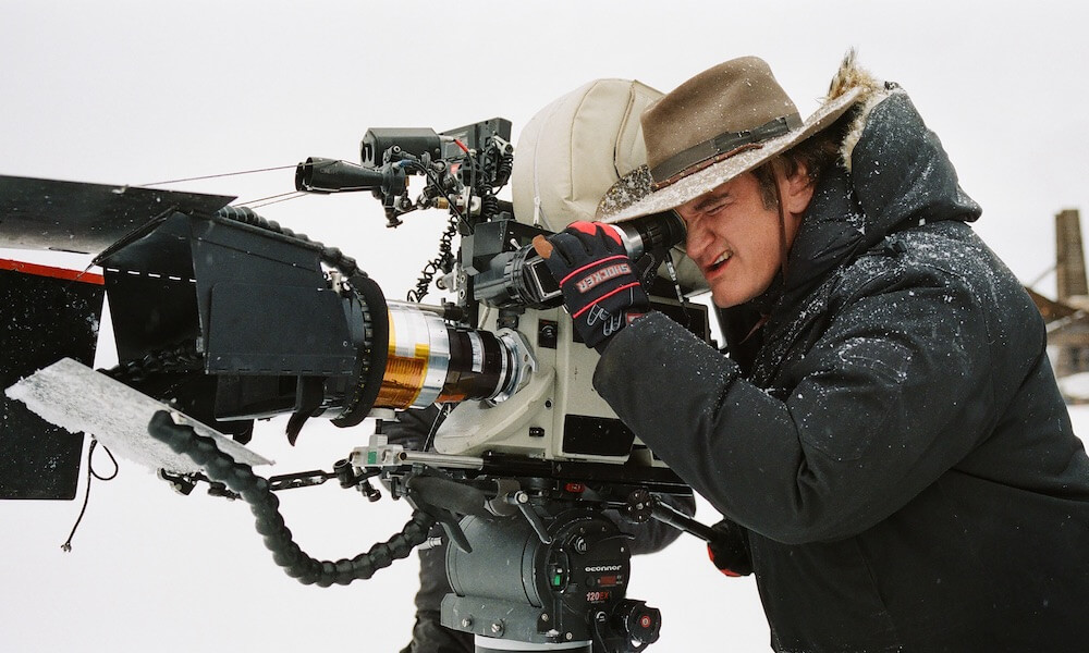 Director Quentin Tarantino on the set of 'The Hateful Eight' with an APO Panatar cylindrical anamorphic lens